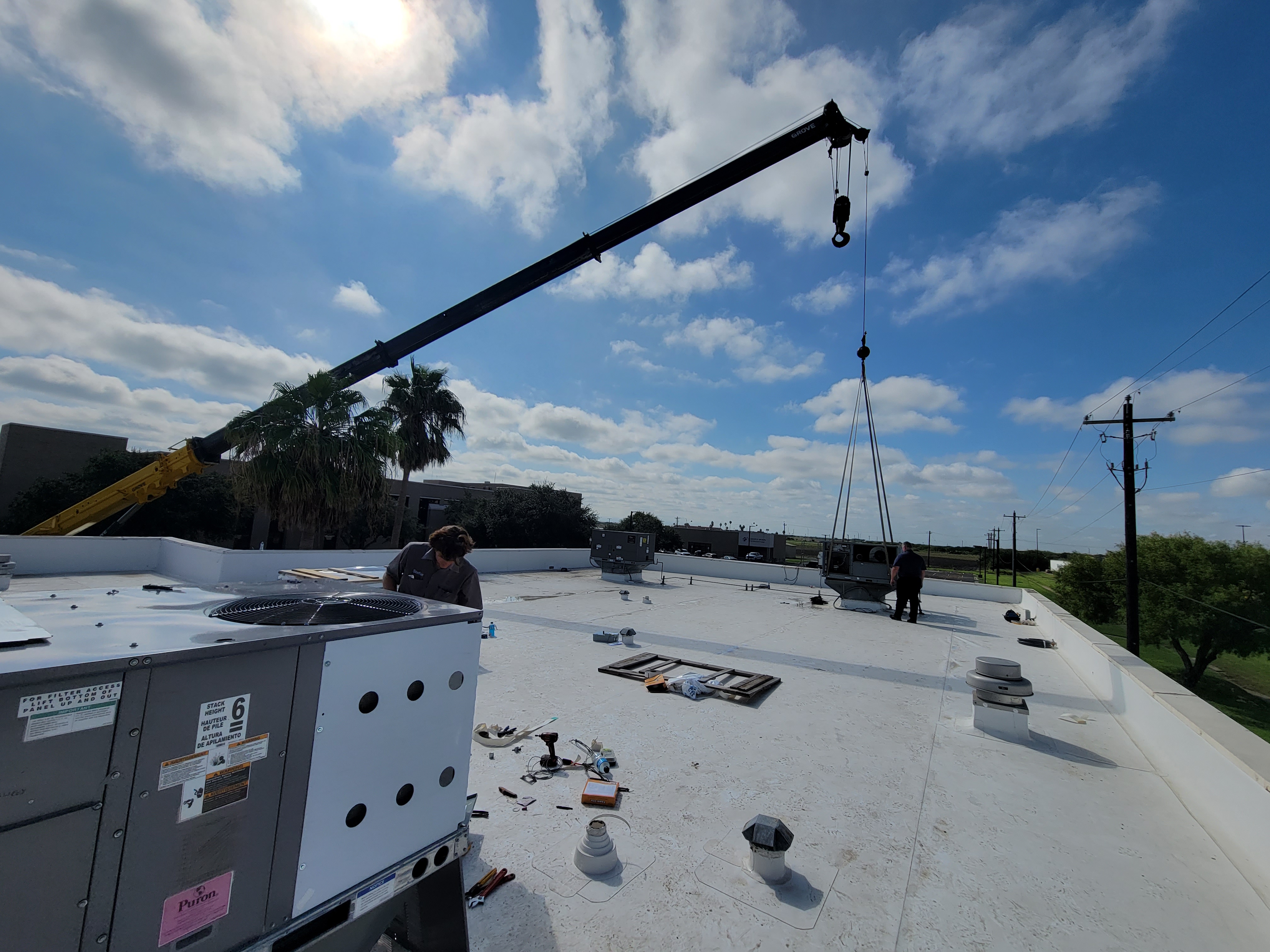 Rooftop unit service with harness and safety setup